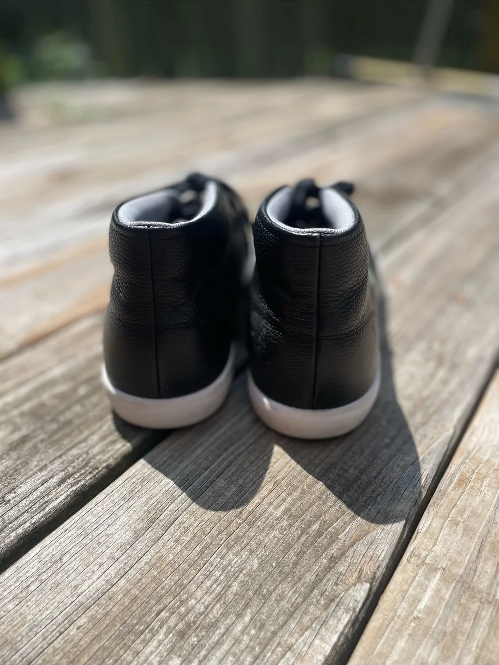 Lacoste Men's Black Leather Slip-On Style Sneakers with White Sole